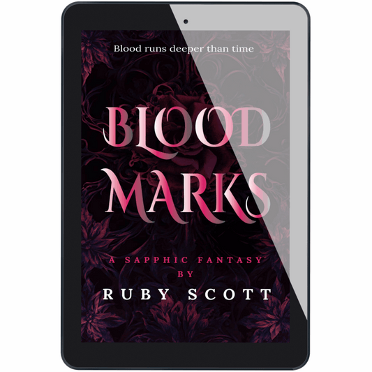 Tablet displaying the ebook cover of Blood Marks by Ruby Scott, a sapphic fantasy romance novel that explores themes of love, legacy, and opposites attracting in a slow burn holiday setting. A captivating lesbian love story.
