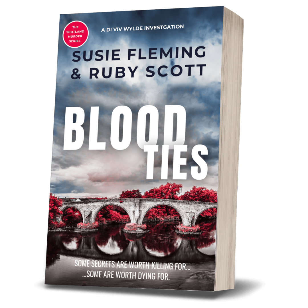 A 3D mockup of a paperback book titled 'Blood Ties' by Susie Fleming & Ruby Scott, showing the front cover and the beige page edges of the book against a white background.