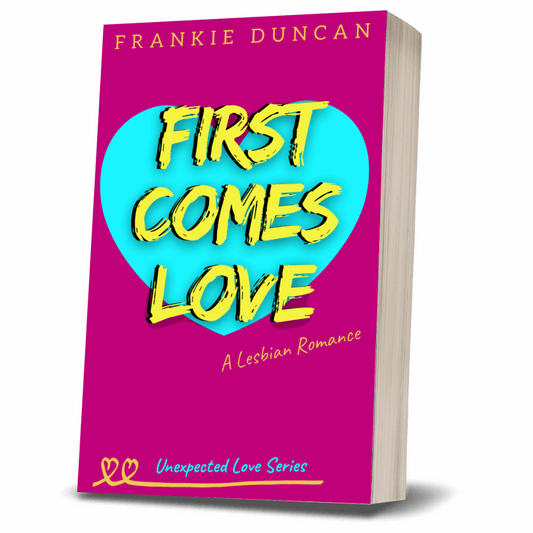 paperback book cover of "First Comes Love" by Frankie Duncan, published under lesbian romance fiction author Ruby Scott. This lesbian love story is part of the Unexpected Love Series and features bold pink and blue colors with a heart-centered design, representing a heartfelt sapphic romance book in the small-town genre.