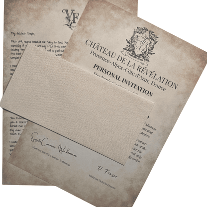 A vintage-style personal invitation letter partially covered by an envelope, addressed from Château de la Révélation in Provence, France. The letter features elegant fonts, a crest of entwined female figures, and is signed by Mistress Suzette Conner-Wakeman and Mistress Victoria Fraser. A handwritten note is faintly visible on the second page behind the invitation.