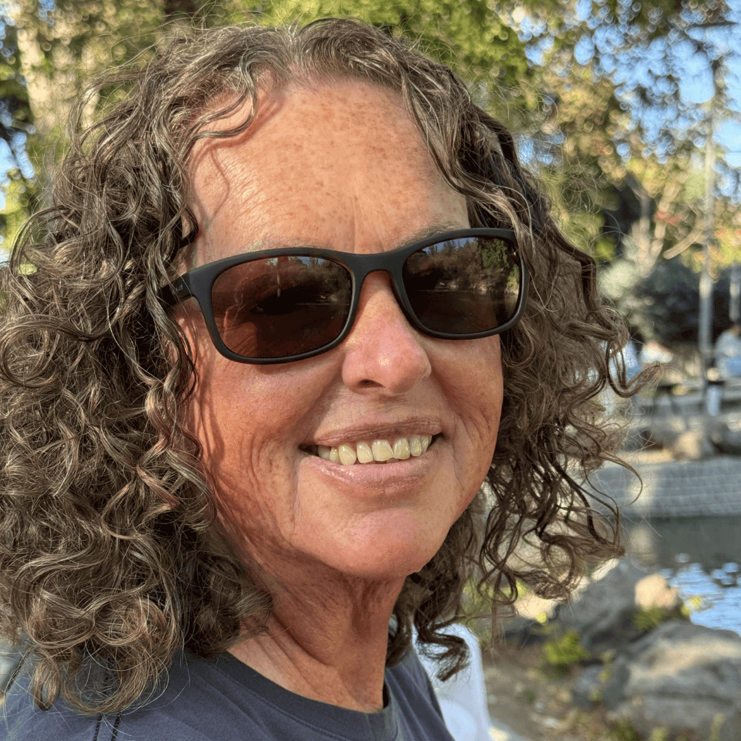 Profile picture of lesbian romance author Ruby Scott, known for lesbian romance book, lesbian love story, lesbian fiction including the Awakening of Desire series.