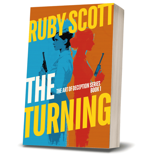 Paperback cover of The Turning by lesbian romance author Ruby Scott, a steamy lesbian love story in The Art of Deception series. Dynamic cover with two women back-to-back holding guns, symbolising suspense, passion, and intrigue. A lesbian romance book, lesbian love story, lesbian fiction.