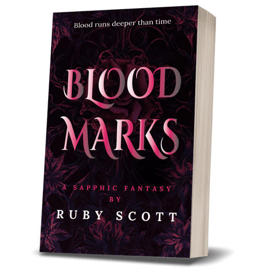 Sapphic Romantasy book cover image featuring the paperback edition of Blood Marks by Ruby Scott, representing a lesbian romance book, lesbian love story, and lesbian fiction by lesbian romance author Ruby Scott and lesbian romance fiction author Ruby Scott.
