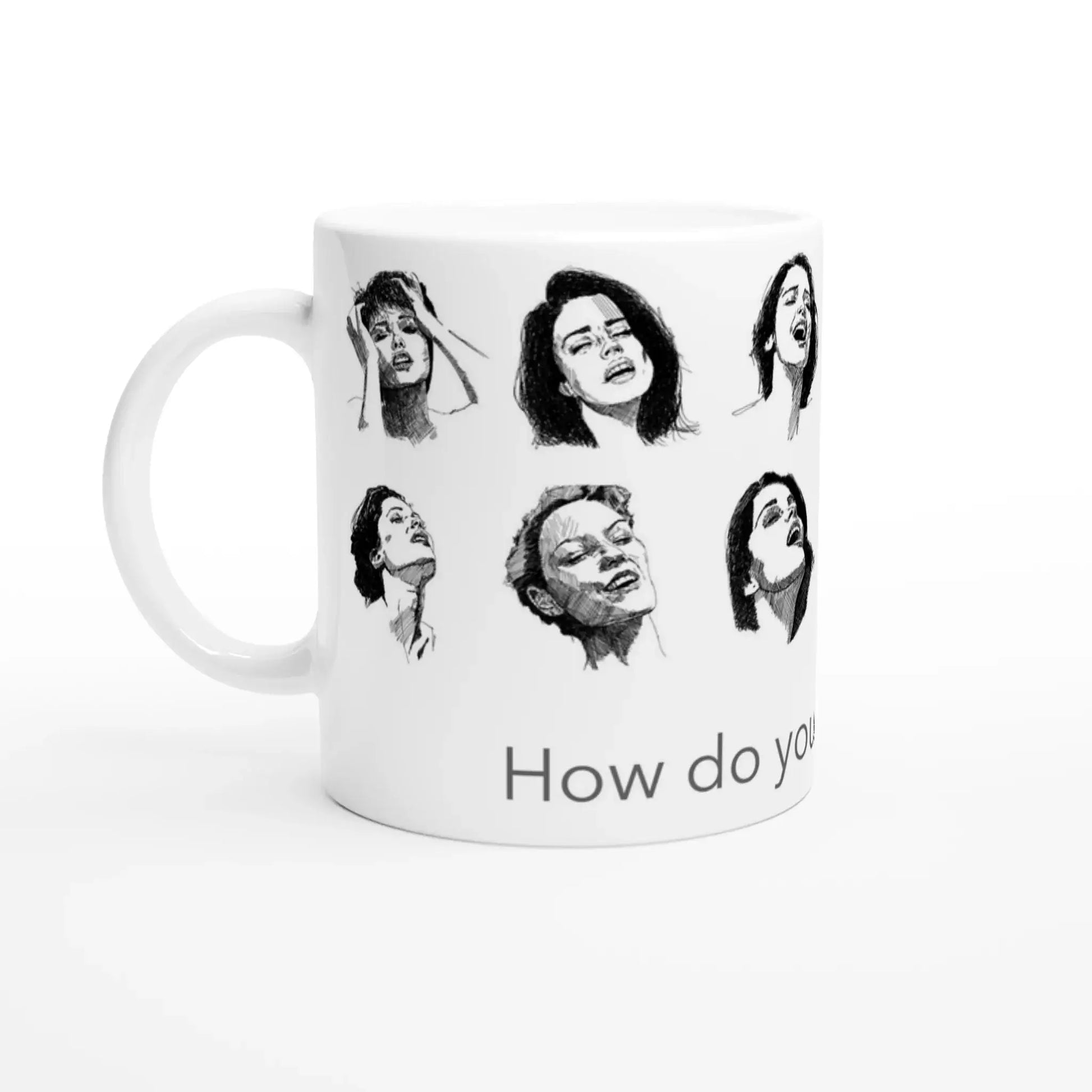Smut reader mug with black and white expressive face illustrations and “How do you take yours?” text, shown in a studio mock-up with the handle on the left.