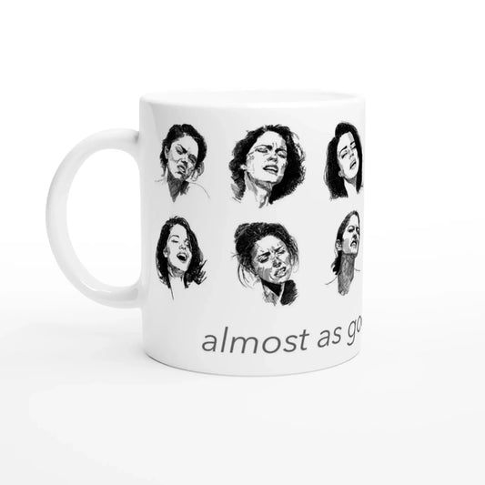 White ceramic mug featuring artistic expressions with the phrase 'almost as good as coffee'.