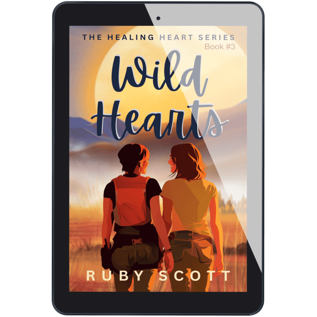 Cover of the signed eBook 'Wild Hearts' featuring two women in a beautiful landscape, part of the Ice Queen romance series.