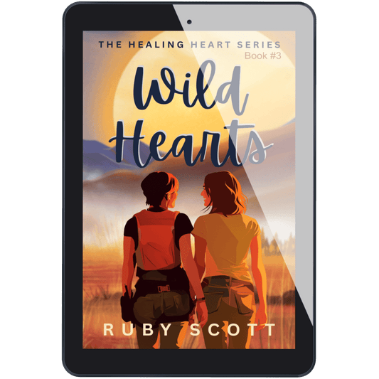 Wild Hearts ebook displayed on a device, sapphic ice queen romance by Ruby Scott